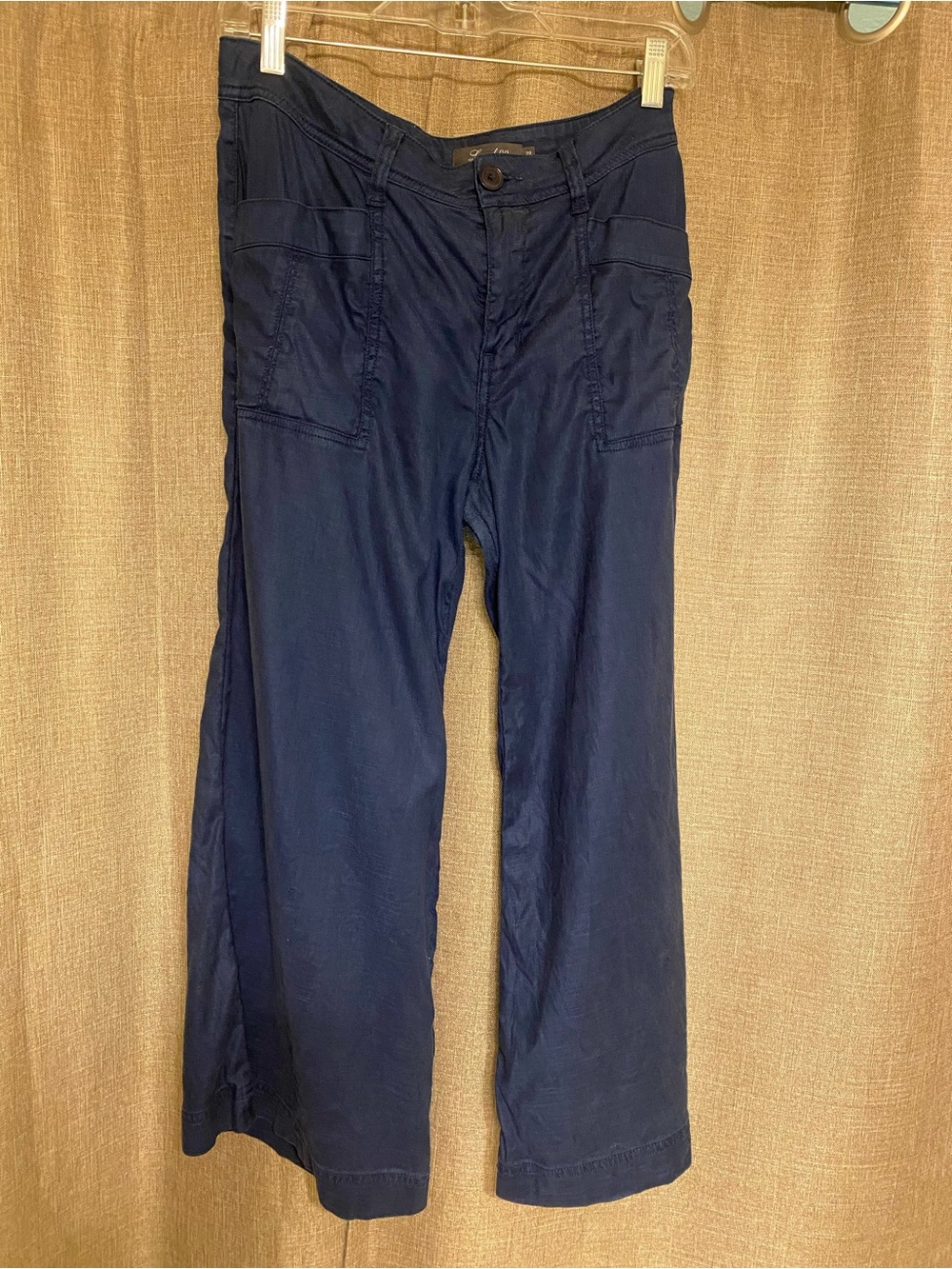Navy blue cropped wide leg pants.